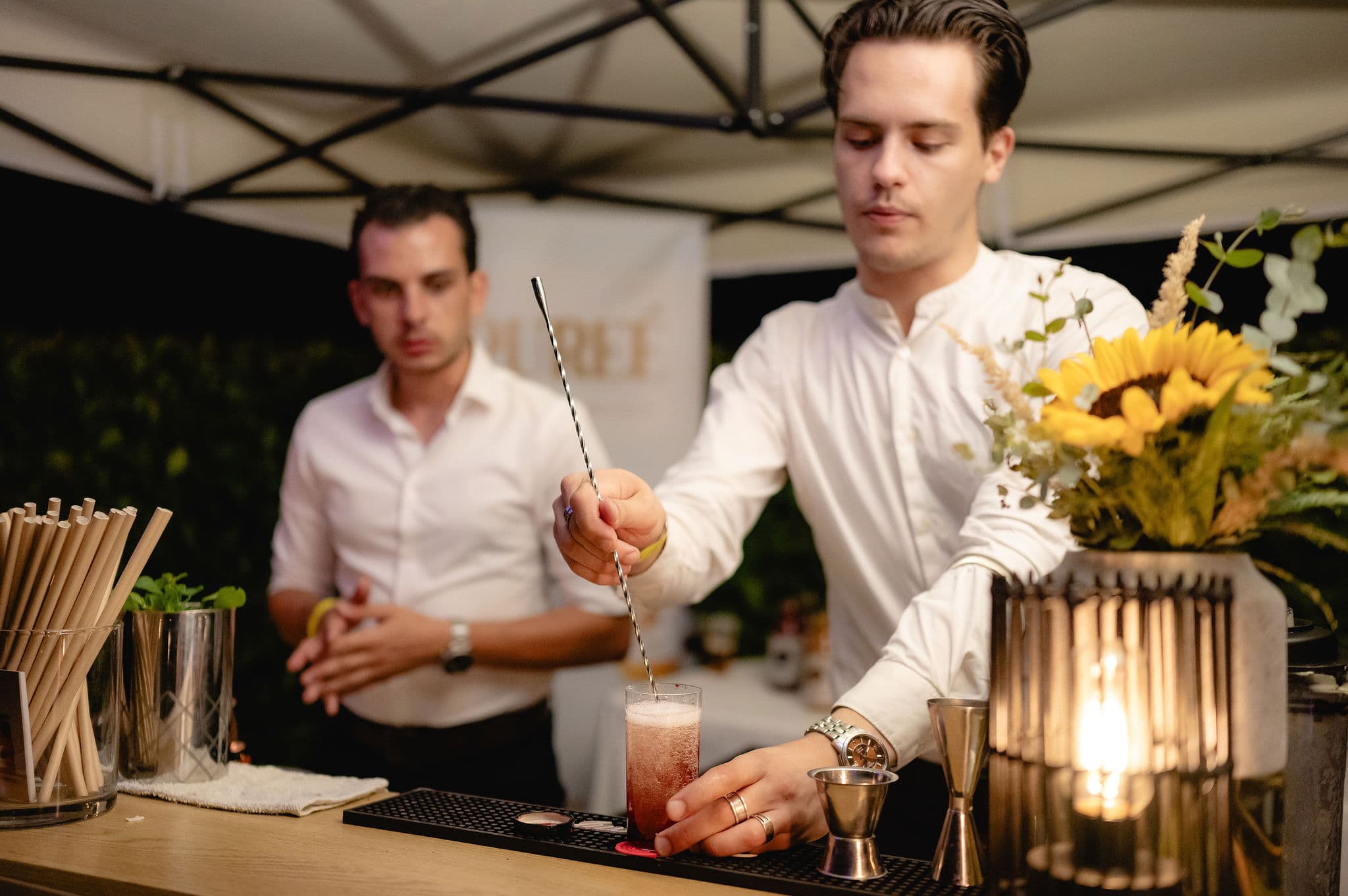 PUREÉ with bartenders and prepared drinks